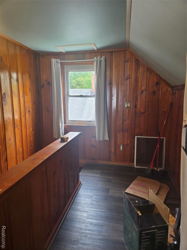 22612 Lyndon St, Detroit, MI 48223 - additional living space featuring wooden walls, dark wood-style flooring, and vaulted ceiling