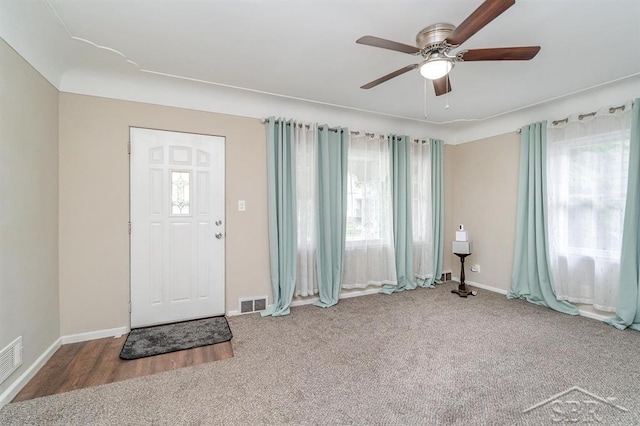 1601 S Monroe St, Bay City, MI 48708 - carpeted entryway featuring a ceiling fan and baseboards