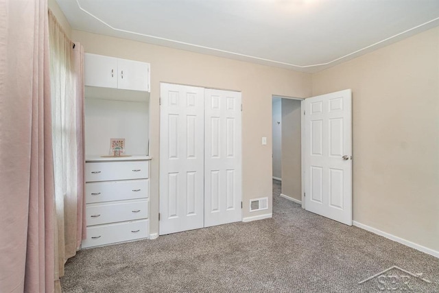1601 S Monroe St, Bay City, MI 48708 - unfurnished bedroom with carpet flooring and a closet