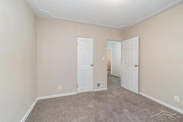 1601 S Monroe St, Bay City, MI 48708 - empty room with carpet