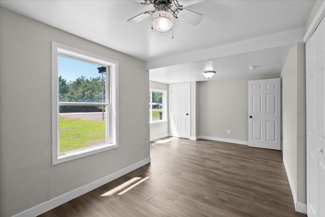 1178 Drent Rd, Muskegon, MI 49442 - unfurnished room with ceiling fan and wood finished floors