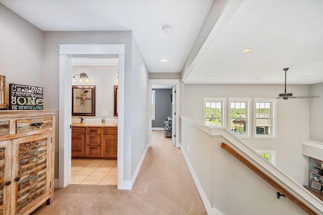 2753 Colton Dr, Berrien Springs, MI 49103 - corridor with light carpet, an upstairs landing, and recessed lighting