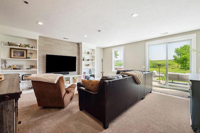 2753 Colton Dr, Berrien Springs, MI 49103 - living room featuring light carpet, built in features, and recessed lighting