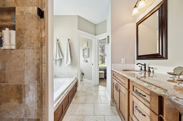 2753 Colton Dr, Berrien Springs, MI 49103 - bathroom with a garden tub, vanity, and a tile shower