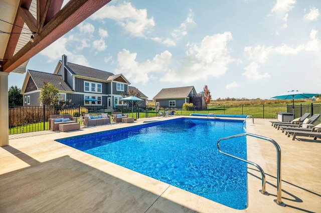 2753 Colton Dr, Berrien Springs, MI 49103 - view of pool featuring outdoor lounge area, a patio area, and an outbuilding