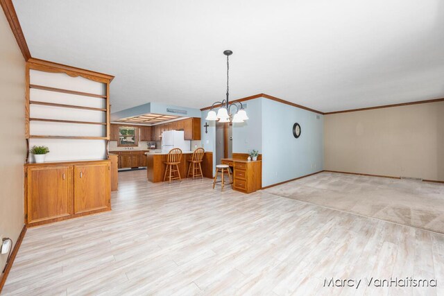 1861 Elizabeth Ln E, Jenison, MI 49428 - dining space with a chandelier, light wood-style flooring, and ornamental molding