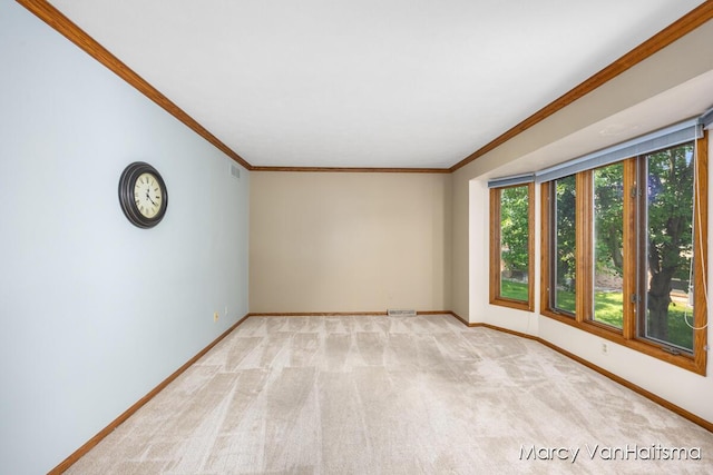 1861 Elizabeth Ln E, Jenison, MI 49428 - empty room featuring ornamental molding and light carpet