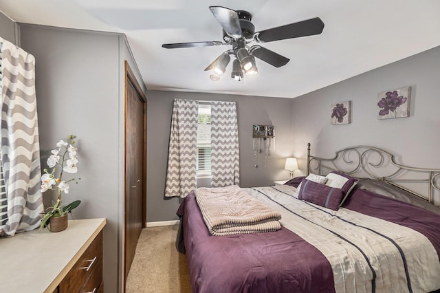 3923 Perry Ave SW, Wyoming, MI 49519 - bedroom featuring light carpet and a ceiling fan