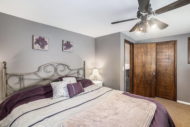 3923 Perry Ave SW, Wyoming, MI 49519 - bedroom with carpet floors, a closet, and a ceiling fan