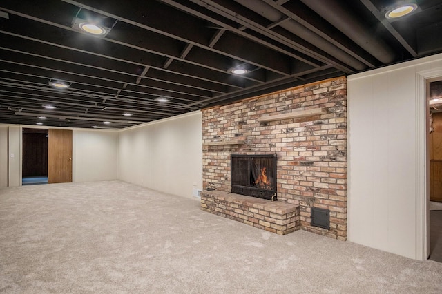 3737 Peach Ridge Ave NW, Grand Rapids, MI 49544 - finished below grade area featuring carpet flooring and a brick fireplace
