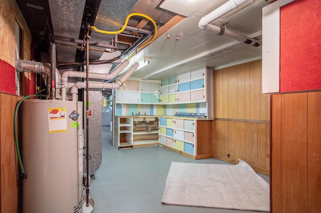 3737 Peach Ridge Ave NW, Grand Rapids, MI 49544 - unfinished basement with water heater and wood walls