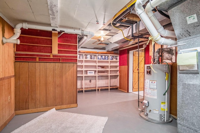 3737 Peach Ridge Ave NW, Grand Rapids, MI 49544 - unfinished basement with water heater and wood walls