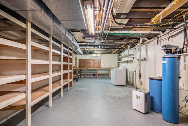3737 Peach Ridge Ave NW, Grand Rapids, MI 49544 - unfinished below grade area with washer / clothes dryer and a water softener