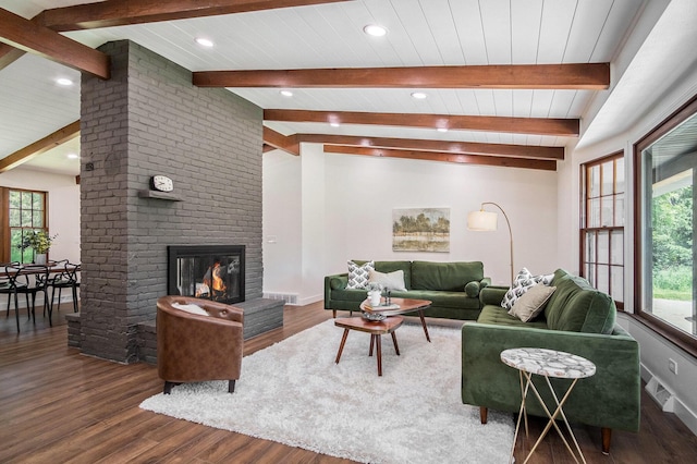 3737 Peach Ridge Ave NW, Grand Rapids, MI 49544 - living room with plenty of natural light, wood finished floors, a brick fireplace, and recessed lighting