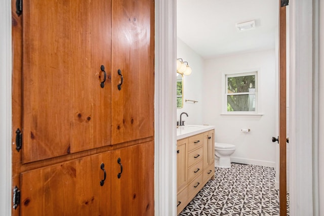 3737 Peach Ridge Ave NW, Grand Rapids, MI 49544 - bathroom featuring vanity and tile patterned floors