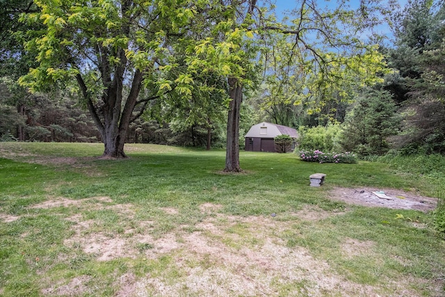 3737 Peach Ridge Ave NW, Grand Rapids, MI 49544 - view of green lawn with an outbuilding