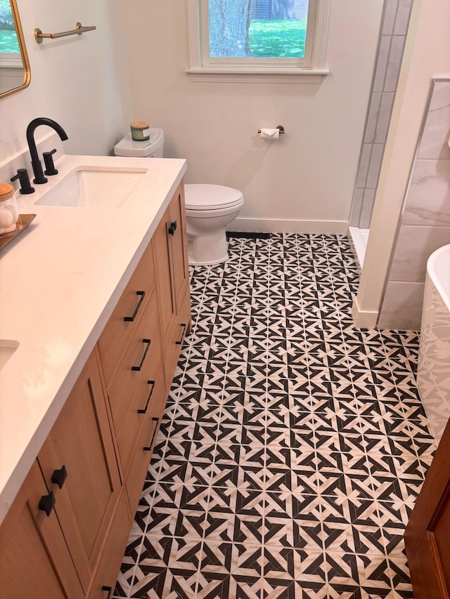 3737 Peach Ridge Ave NW, Grand Rapids, MI 49544 - full bath with vanity, tile patterned floors, and a shower
