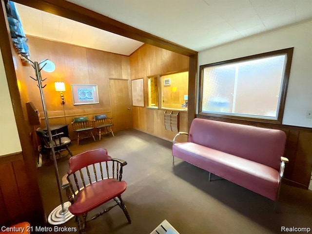 106 N Marquette St, Durand, MI 48429 - sitting room with wood walls and carpet flooring