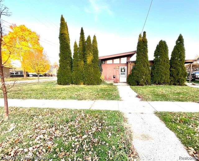 106 N Marquette St, Durand, MI 48429 - view of property's community featuring a lawn