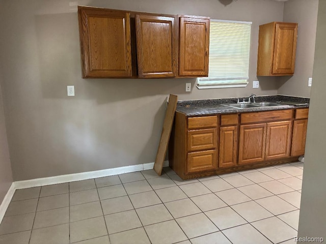 6303 Duncan St, Taylor, MI 48180 - kitchen with dark countertops and brown cabinets