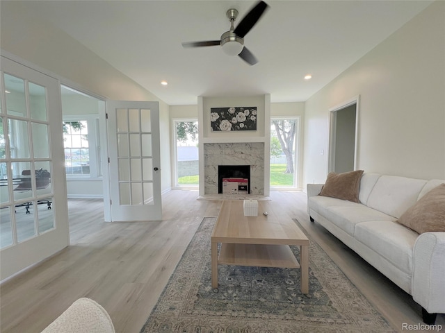 19904 Mckinnon St, Roseville, MI 48066 - living area with light wood-style flooring, ceiling fan, a premium fireplace, and recessed lighting