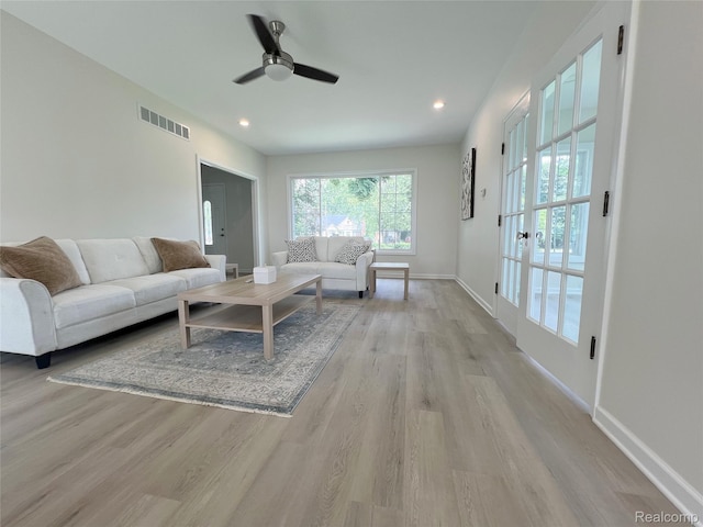 19904 Mckinnon St, Roseville, MI 48066 - living room with light wood-type flooring, a ceiling fan, and recessed lighting