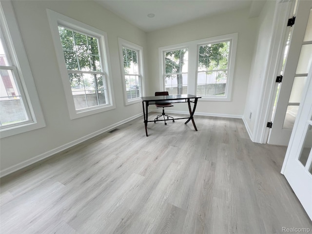 19904 Mckinnon St, Roseville, MI 48066 - office space featuring plenty of natural light and wood finished floors