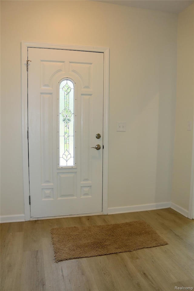 19904 Mckinnon St, Roseville, MI 48066 - foyer featuring wood finished floors