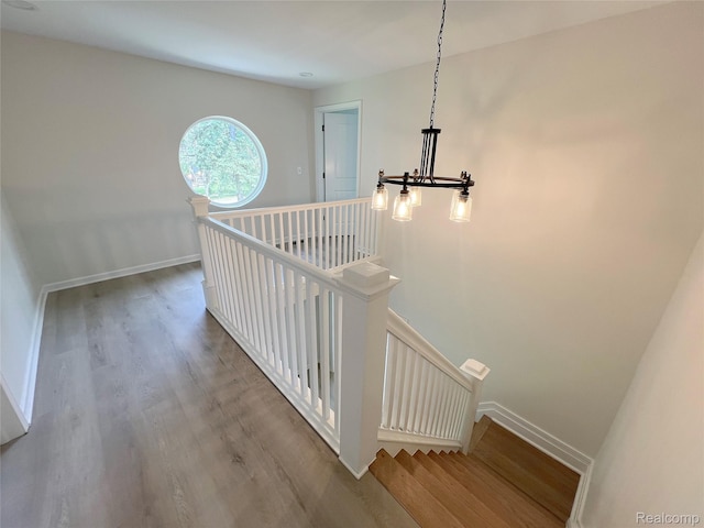 19904 Mckinnon St, Roseville, MI 48066 - stairs with wood finished floors and baseboards
