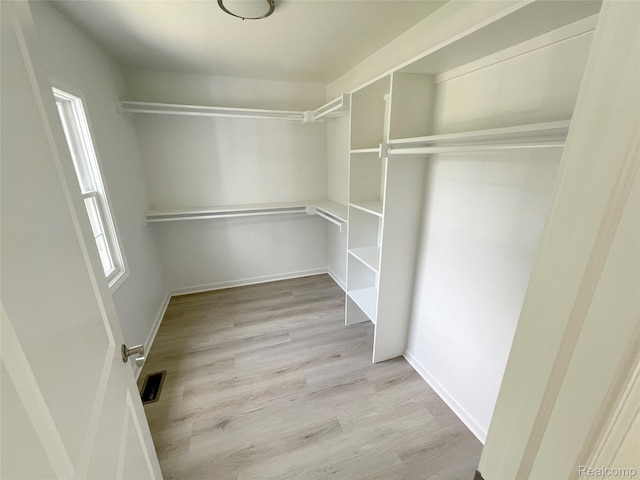 19904 Mckinnon St, Roseville, MI 48066 - spacious closet featuring wood finished floors