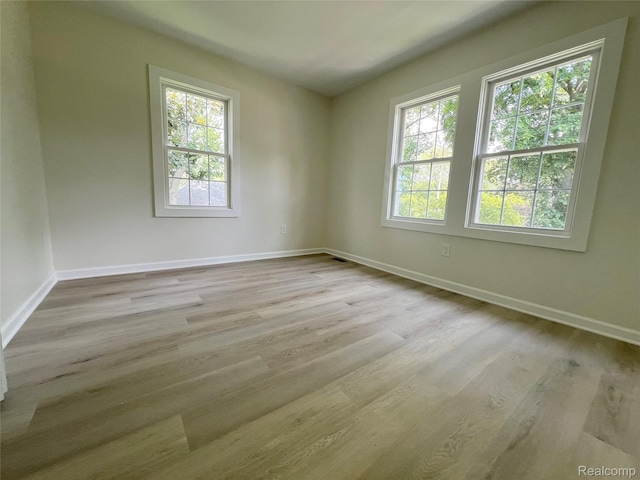 19904 Mckinnon St, Roseville, MI 48066 - unfurnished room featuring wood finished floors and baseboards