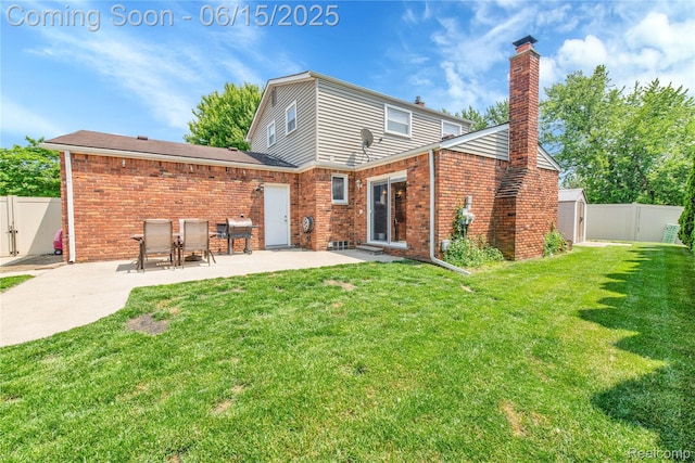 22086 Hillcrest Ct, Woodhaven, MI 48183 - back of property featuring a patio area, a fenced backyard, a chimney, and brick siding