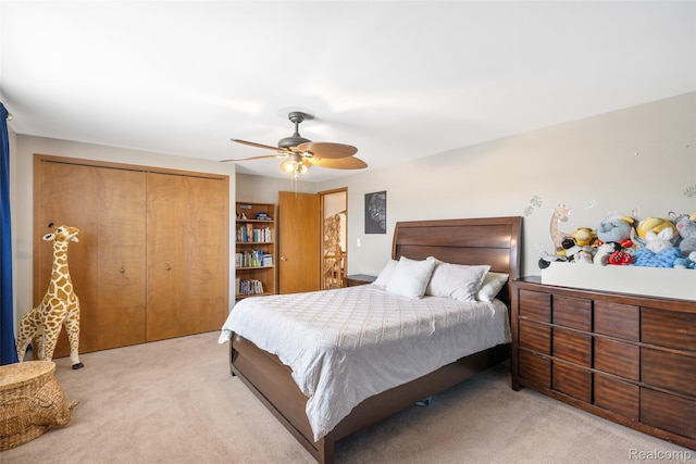 35772 Bal Clair St, New Baltimore, MI 48047 - bedroom with light carpet, a closet, and a ceiling fan