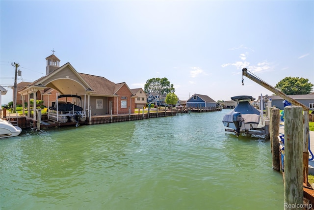 35772 Bal Clair St, New Baltimore, MI 48047 - dock featuring boat lift and a water view