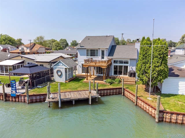 35772 Bal Clair St, New Baltimore, MI 48047 - dock area featuring a gazebo, a deck with water view, a residential view, and a yard