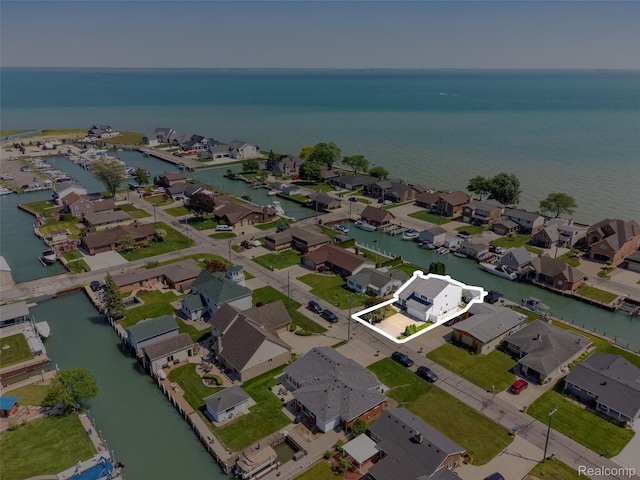 35772 Bal Clair St, New Baltimore, MI 48047 - aerial overview of property's location featuring a large body of water and nearby suburban area