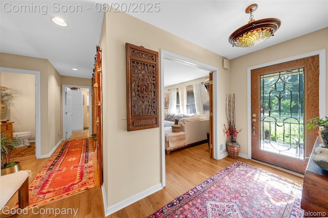 115 Audubon Dr, White Lake, MI 48383 - entryway featuring light wood finished floors and recessed lighting