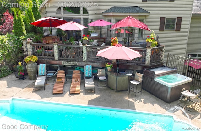 115 Audubon Dr, White Lake, MI 48383 - view of pool featuring outdoor dining space, a patio area, and a wooden deck