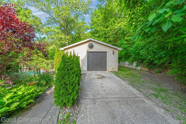 115 Audubon Dr, White Lake, MI 48383 - detached garage with concrete driveway
