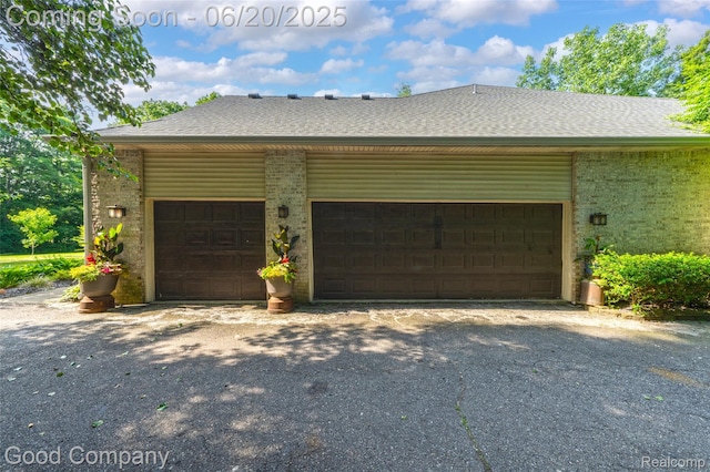 115 Audubon Dr, White Lake, MI 48383 - view of garage