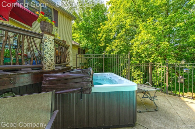 115 Audubon Dr, White Lake, MI 48383 - view of patio with a hot tub and stairway