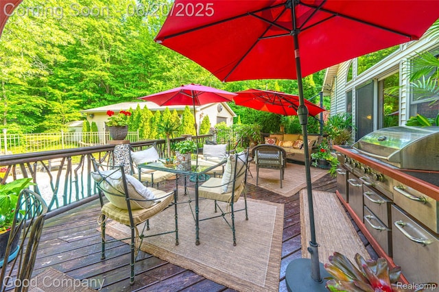 115 Audubon Dr, White Lake, MI 48383 - wooden terrace with outdoor dining area, grilling area, and an outdoor structure