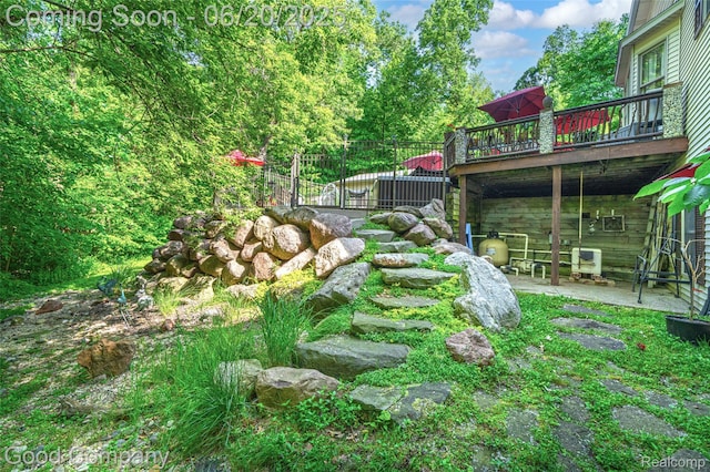 115 Audubon Dr, White Lake, MI 48383 - view of yard with a deck