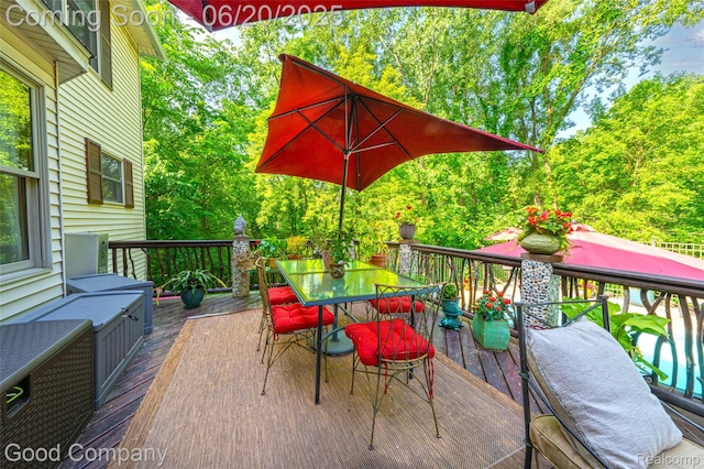 115 Audubon Dr, White Lake, MI 48383 - deck featuring outdoor dining space