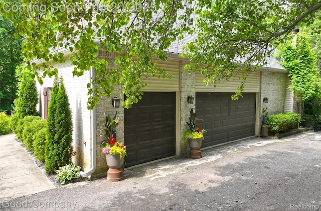 115 Audubon Dr, White Lake, MI 48383 - view of garage