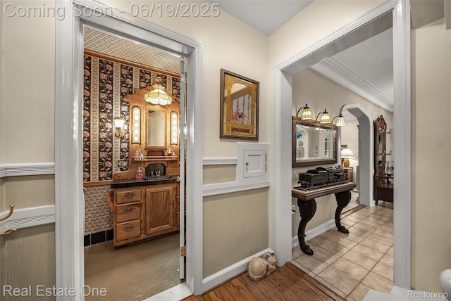 26044 York Rd, Huntington Woods, MI 48070 - wine cellar featuring arched walkways and crown molding