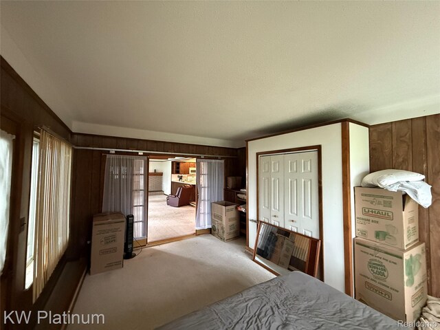 7275 Bluebill St, Clay, MI 48001 - bedroom with carpet flooring and wooden walls