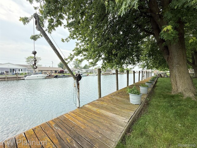 7275 Bluebill St, Clay, MI 48001 - dock featuring a water view