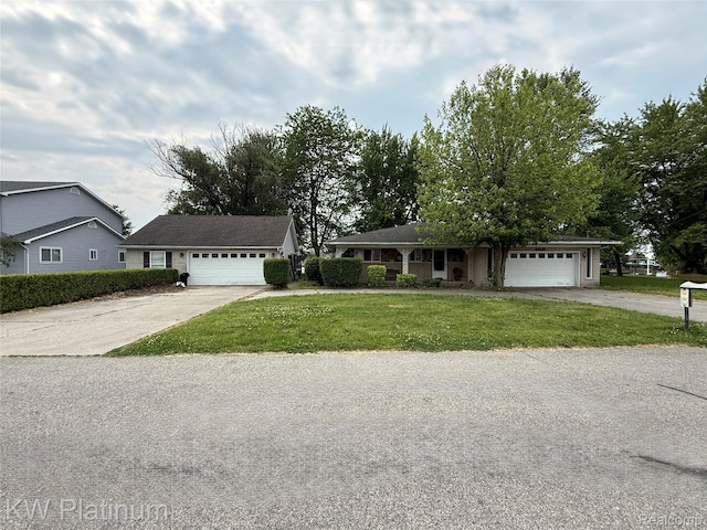 7275 Bluebill St, Clay, MI 48001 - single story home featuring a front yard, an attached garage, and driveway