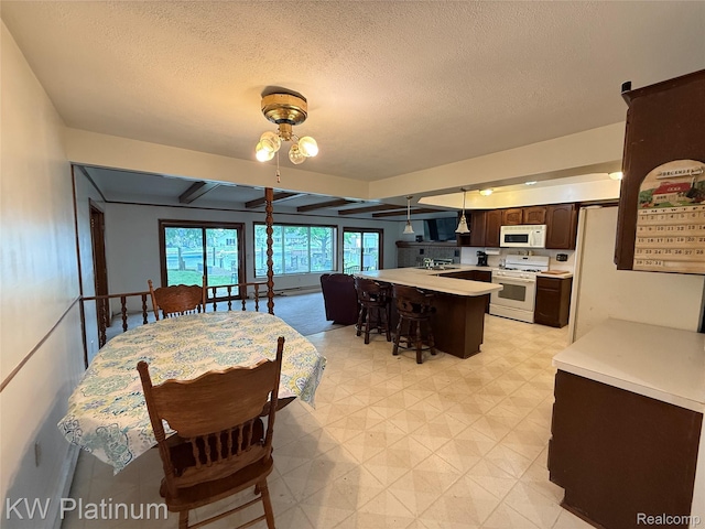 7275 Bluebill St, Clay, MI 48001 - dining area featuring light floors and a textured ceiling